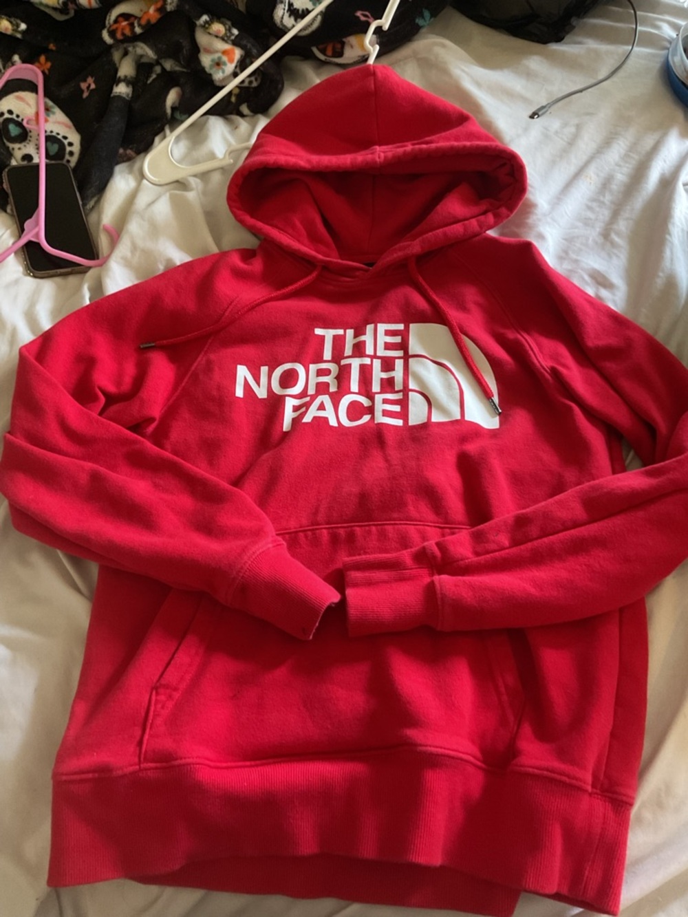 The North Face women’s Red Zip-Up Hoodie with White Logo,